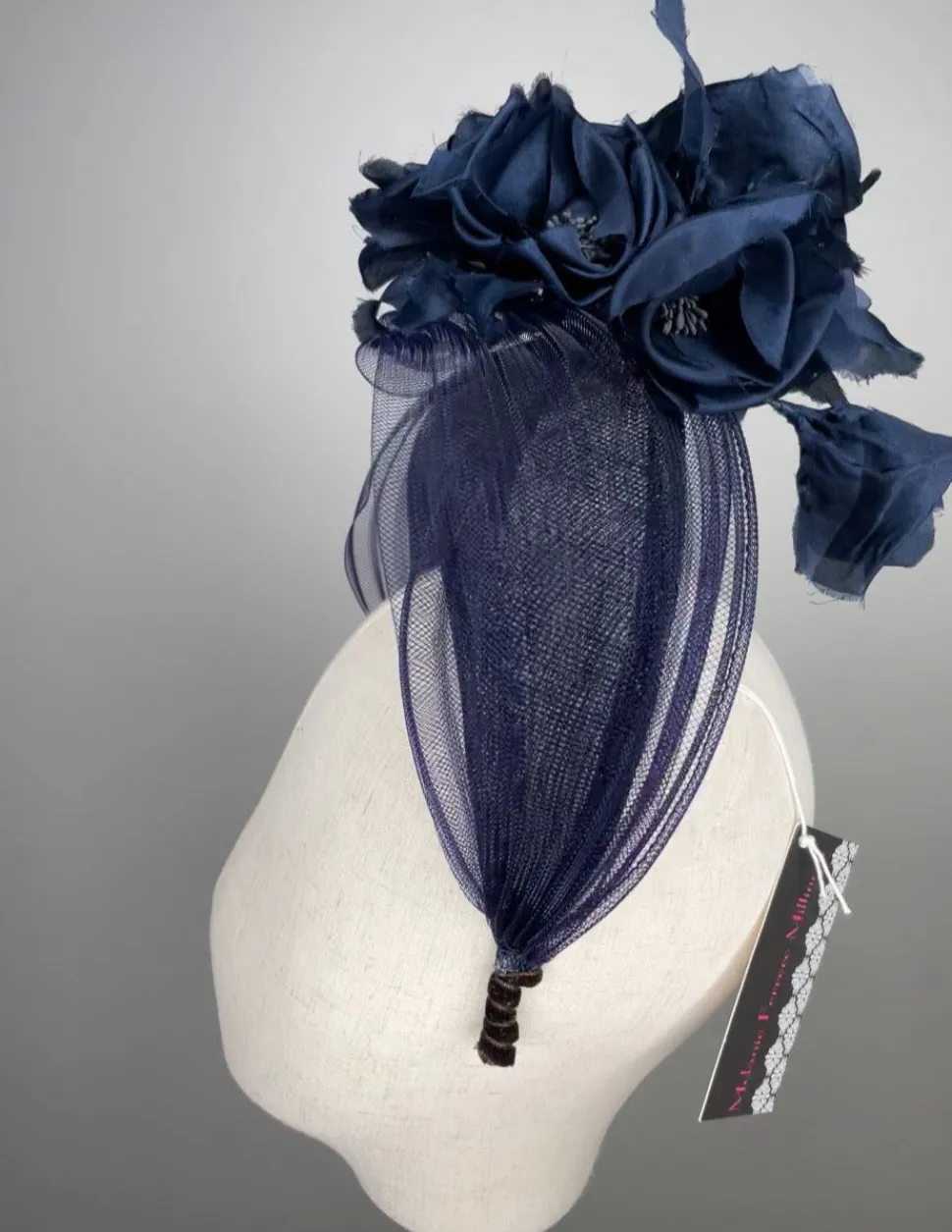 melanie_ferrero__navy_sin_1.webp Melanie Ferrero - Navy Sinamay Halo with Silk Flowers